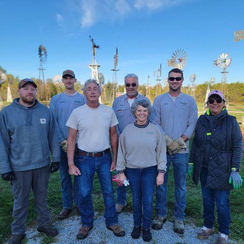Noble REMC employees working at Windmill Museum