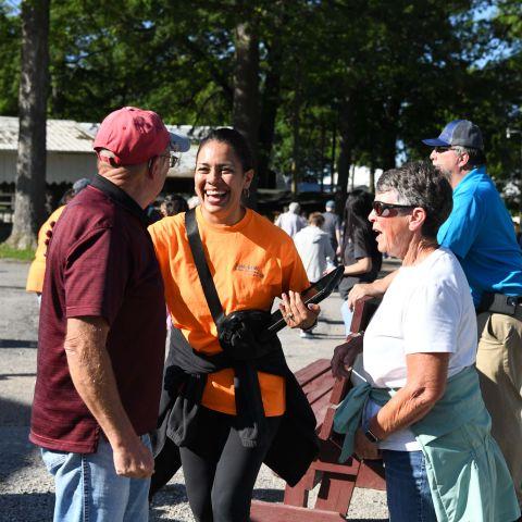 Employee laughing with members