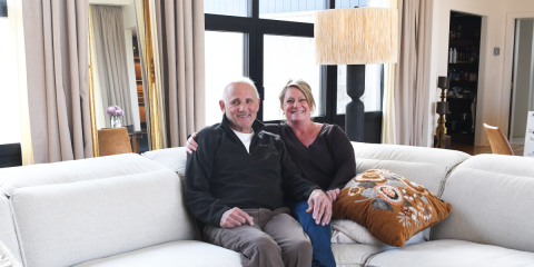 Fred and Jodi Kreigh sitting on couch