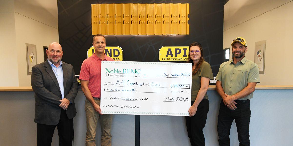 API, Noble REMC reps with check presentation