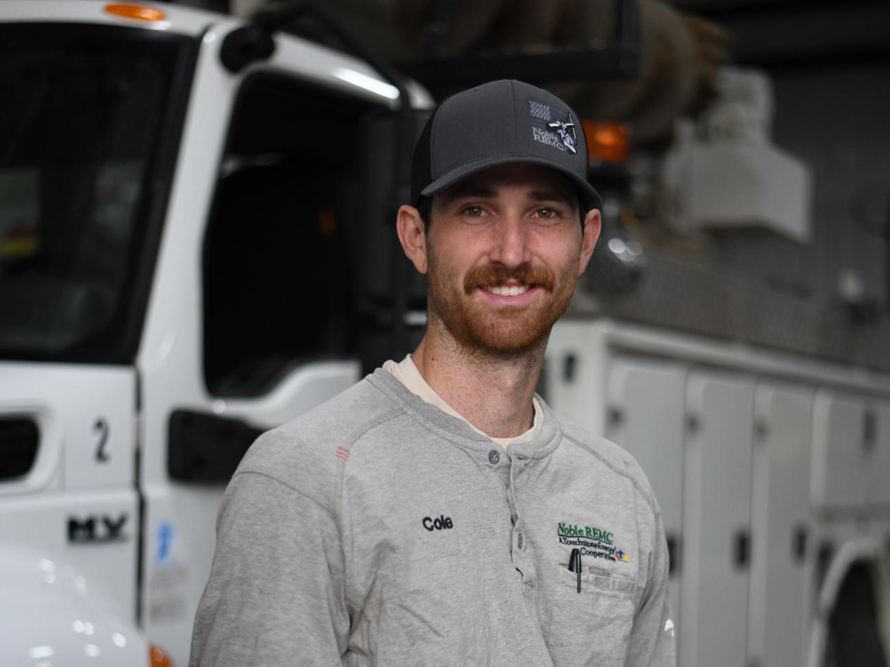 Cole Knox in front of truck