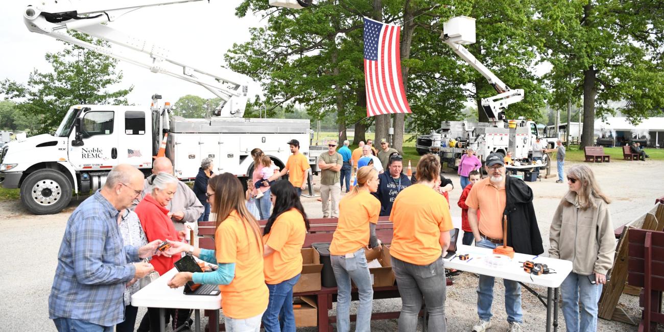 Registration tables with members lined up